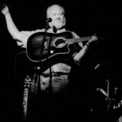 ca 1992. Taken somewhere in England. In 1985, I took a break from the Crickets and played solo gigs, mostly in England, for about ten years. The venues, as a rule, were pubs, small theaters and listening rooms. I loved the atmosphere and the intimacy of it all. Photo by Andy Ellis Sonny-on-stage